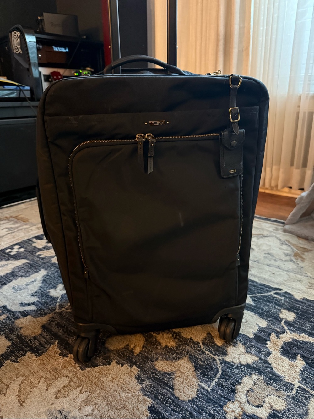 Tumi Black Rolling Travel Carry-On with Front Pocket